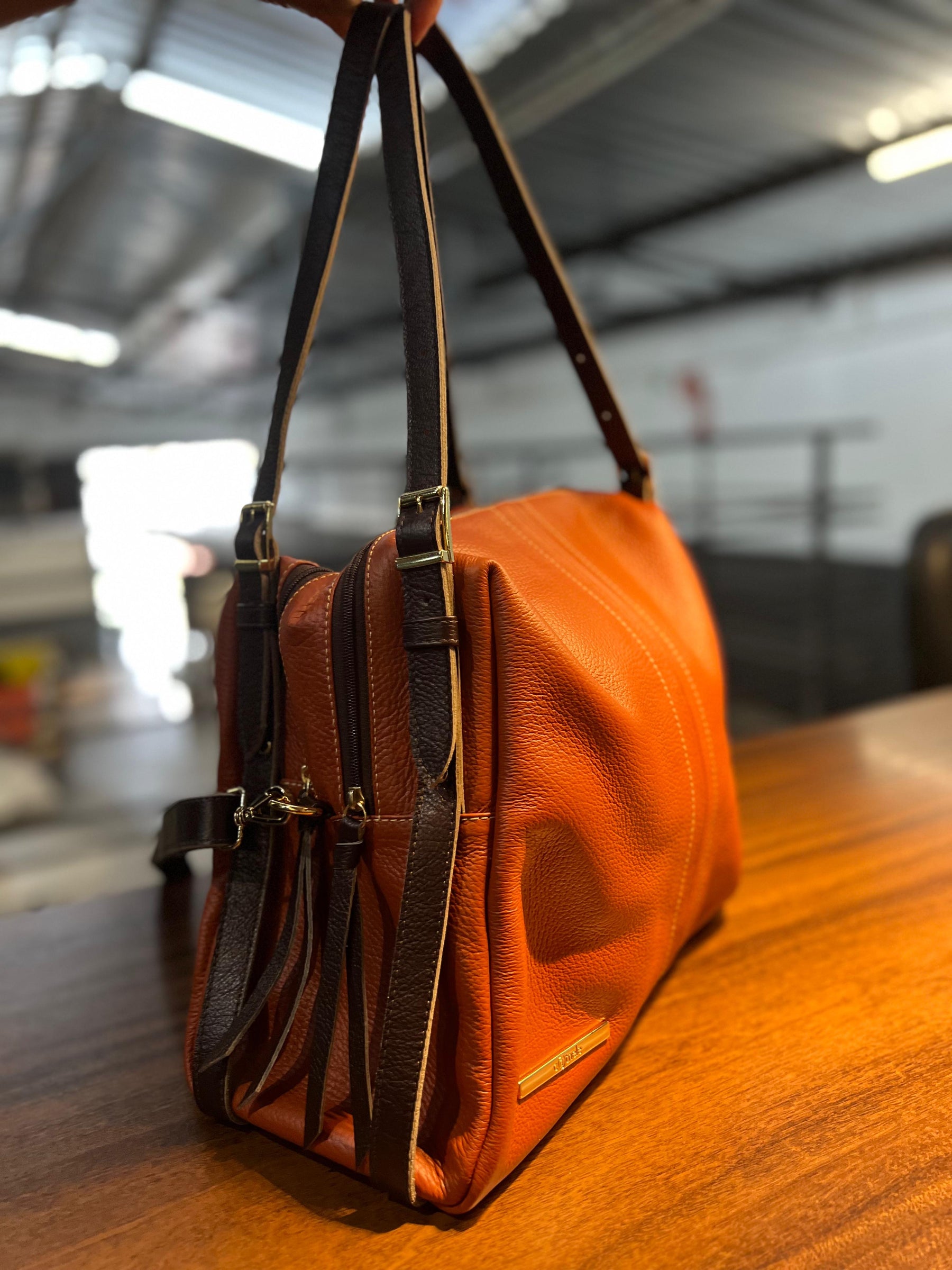 Bolsa NORUEGA em couro Legítimo
