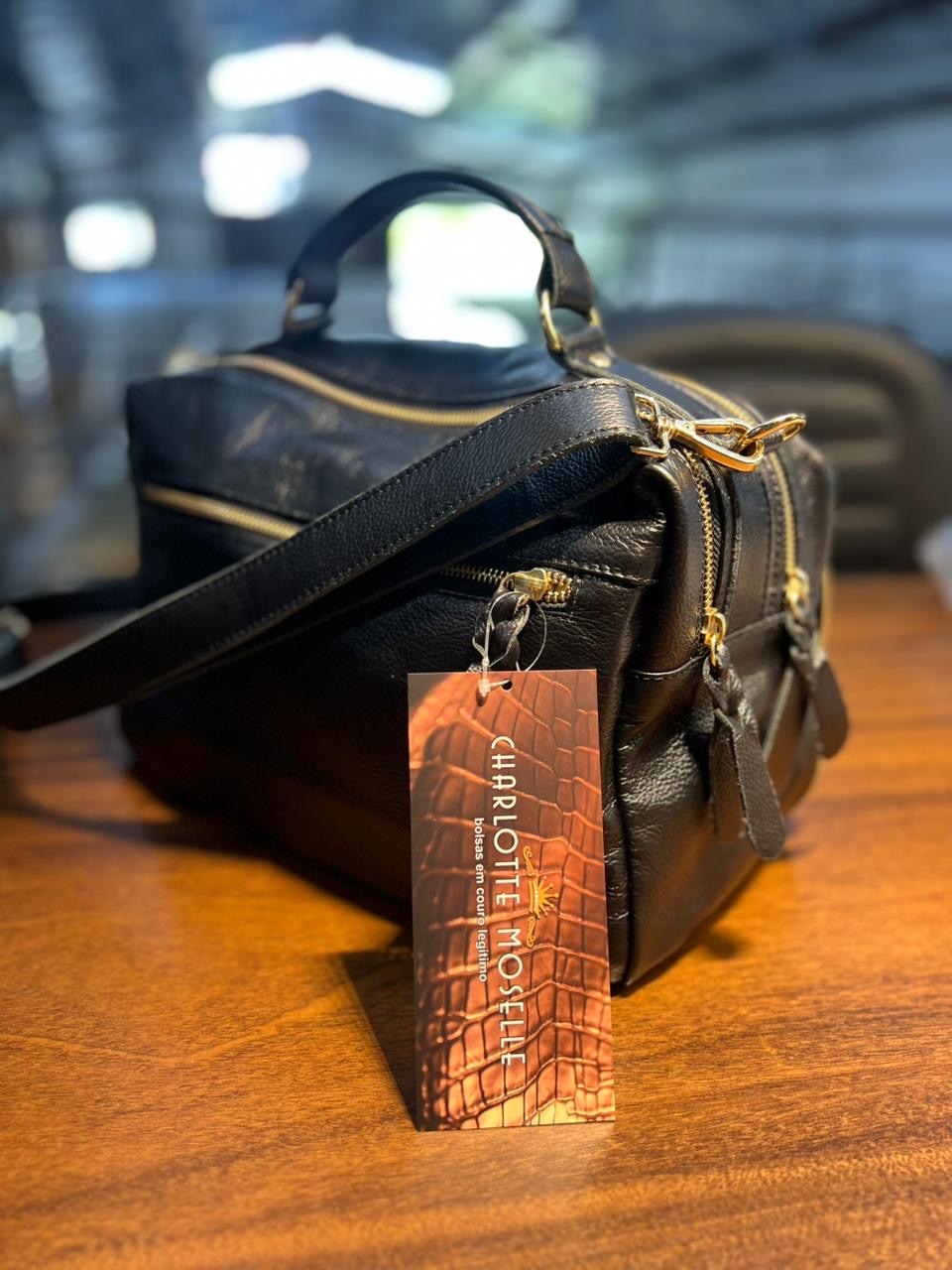 Bolsa SUÍÇA em couro legítimo