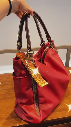 Bolsa AMSTERDÃ em couro legítimo