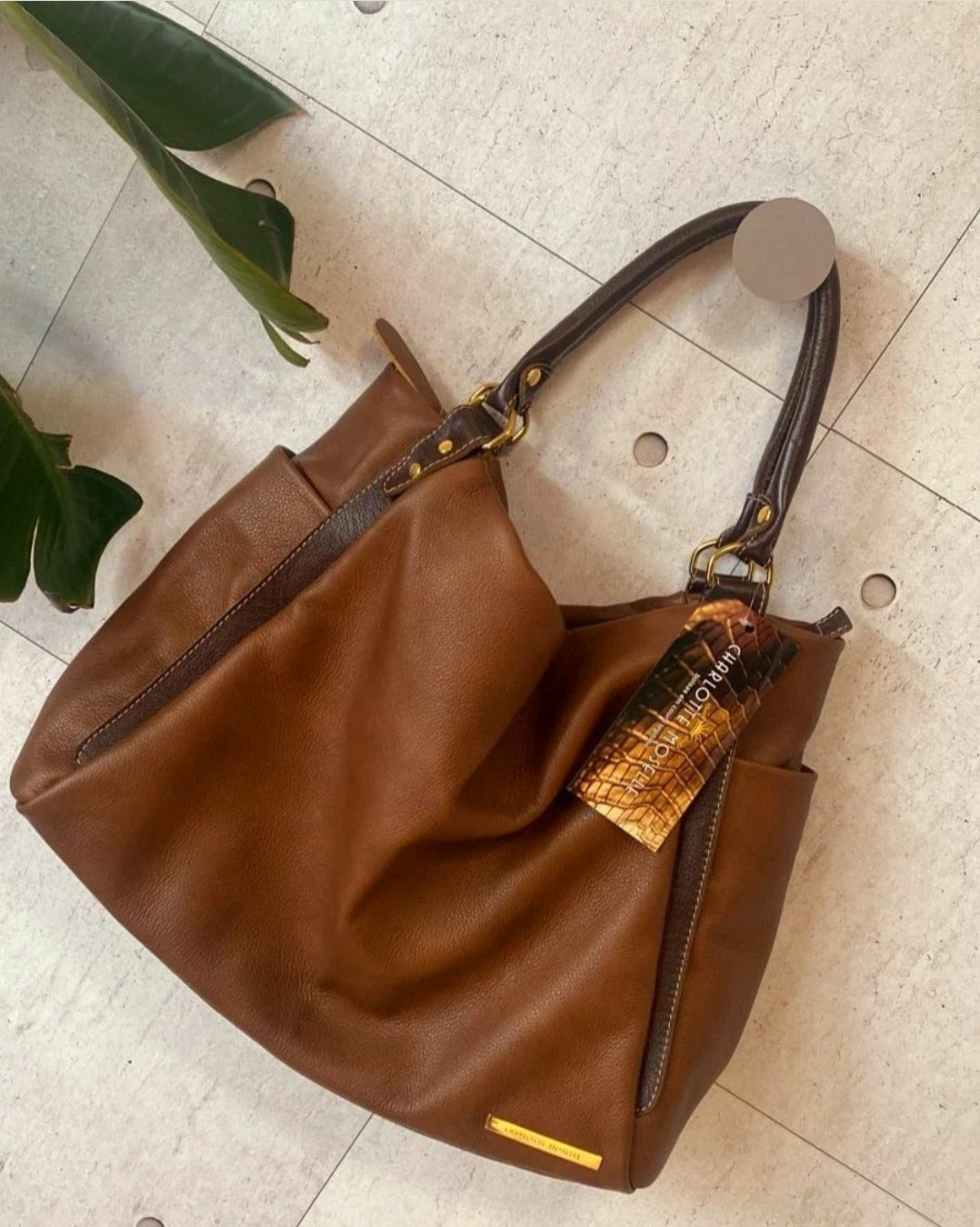 Bolsa AMSTERDÃ em couro legítimo